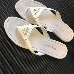 Prada white leather flip flops